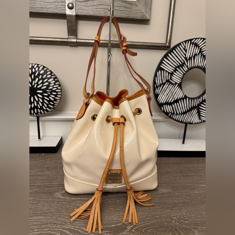 Dooney & Bourke patent leather drawstring bag